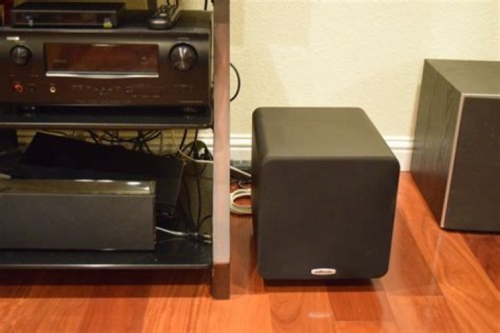 How do I connect my subwoofer to my soundbar Polk?