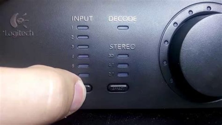 How do I reset my Logitech Z906?