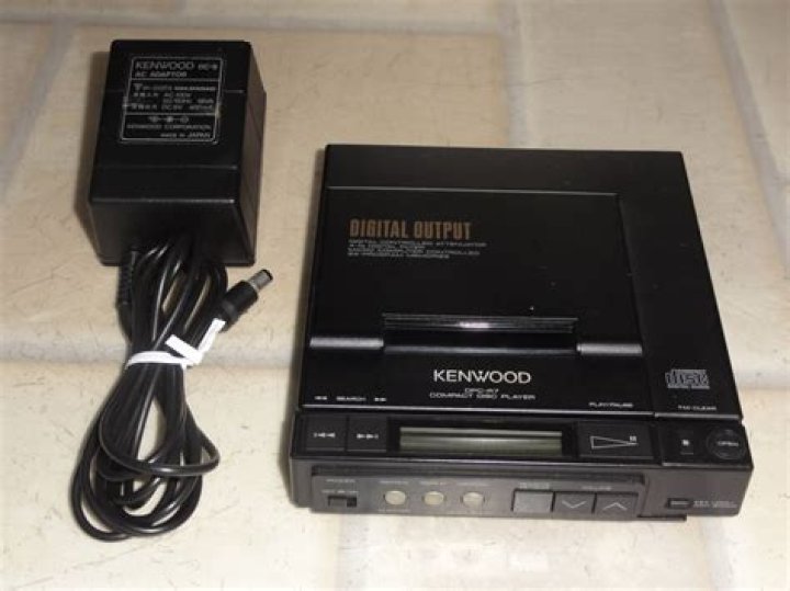 How do you clean a compact disc player?