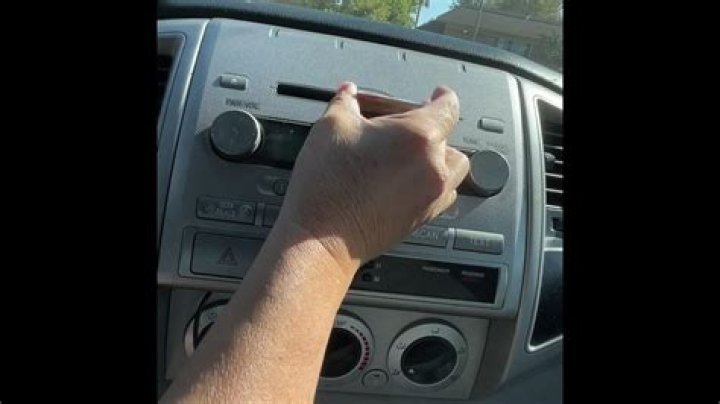 How do you get a stuck CD out of a magazine?