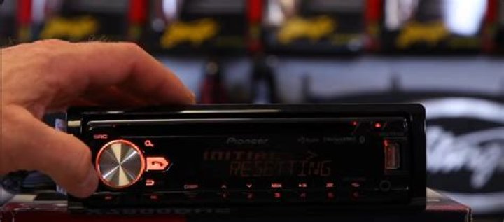 How do you remove the touchscreen on a Pioneer radio?