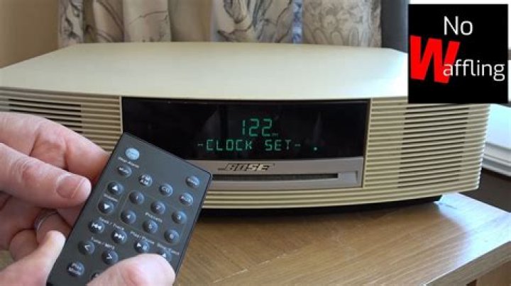 How do you reset the time on a Bose Wave?