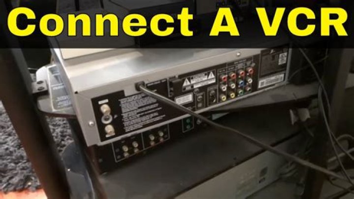 How does a VCR connect to a TV?