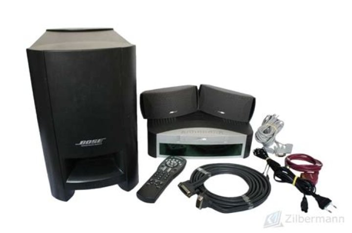 How does the Bose 321 connect to the subwoofer?