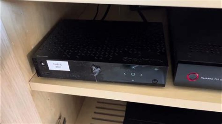 How long does it take for a Spectrum cable box to reboot?
