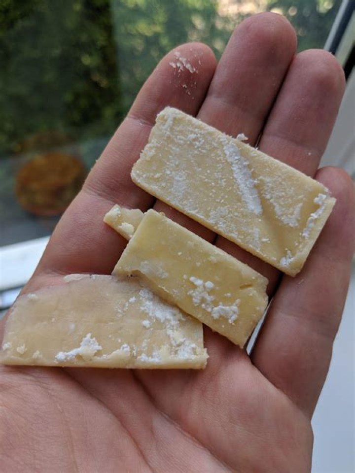 Is it normal for cheddar to have white spots?