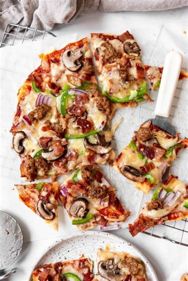 What type of cheese is on St Louis-style pizza?